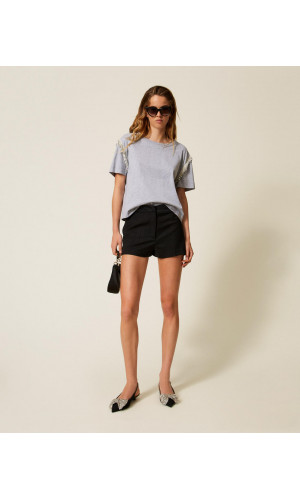 Camiseta con flecos de cuentas