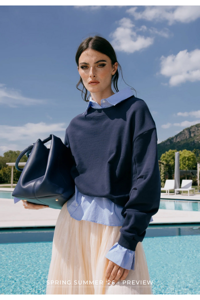 MAGLIA STRATIFICATA DAL DESIGN CONTEMPORANEO