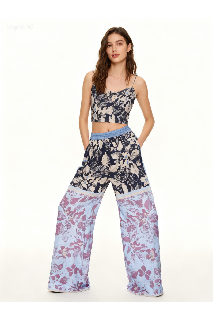 PANTALONI CON MOTIVO DECORATIVO E DESIGN FLUIDO