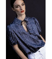 Blusa con tópicos