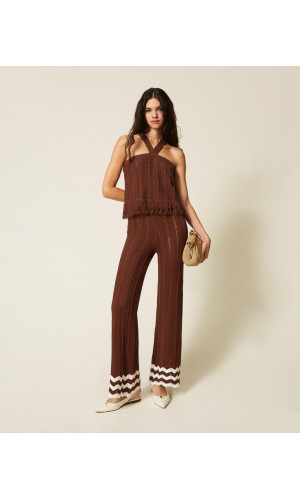 Pantalón de punto con zigzag y flecos
